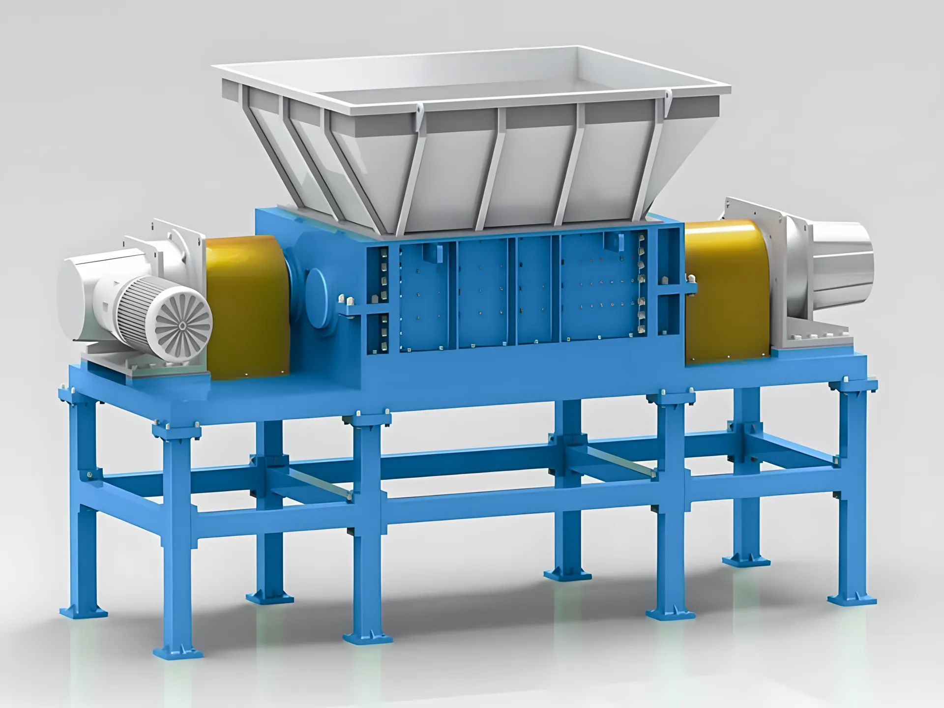 Double-shaft industrial shredder for processing large plastic materials.